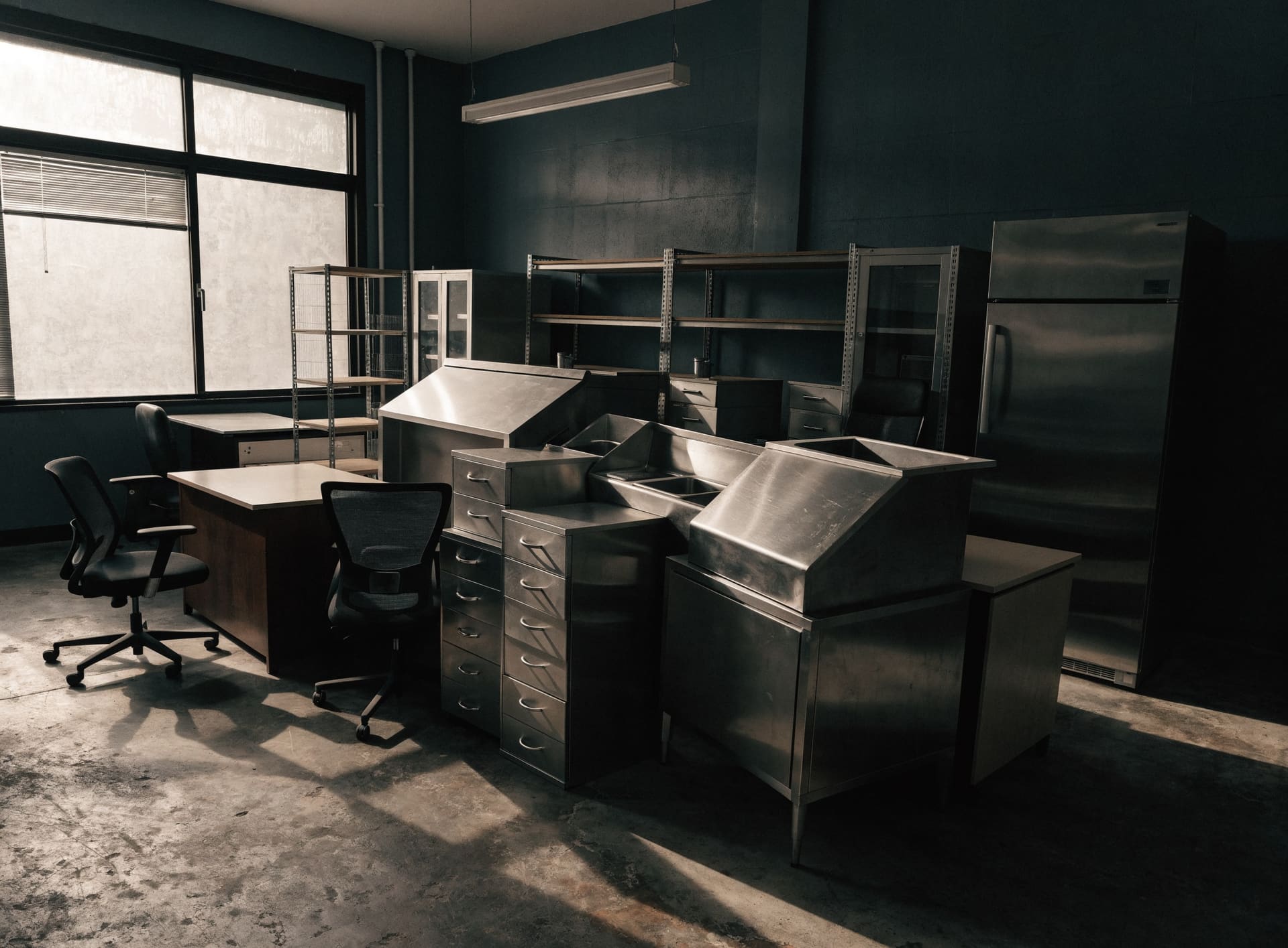 Representative photograph: restaurant equipment, office desks and filing cabinets grouped for sale