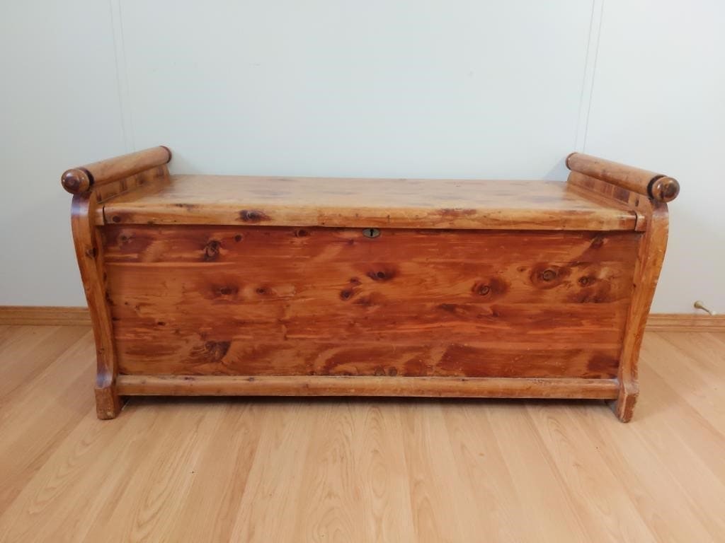 Cedar chest with scrolled ends, photographed for an online auction