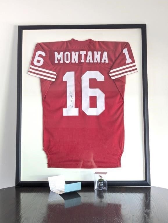 Framed Montana number 16 football jersey